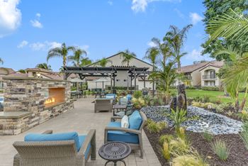 Outdoor social deck with firepits and gas barbeque grills